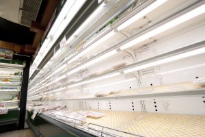 Empty Supermarket Store Shelves